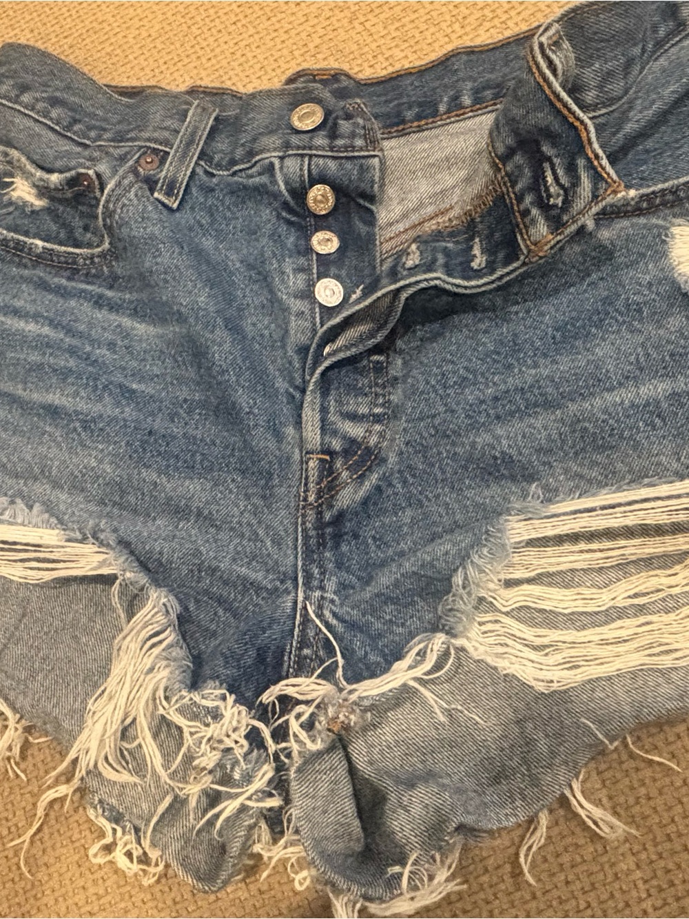 Levi's Faded Blue Frayed Denim Cutoff Shorts